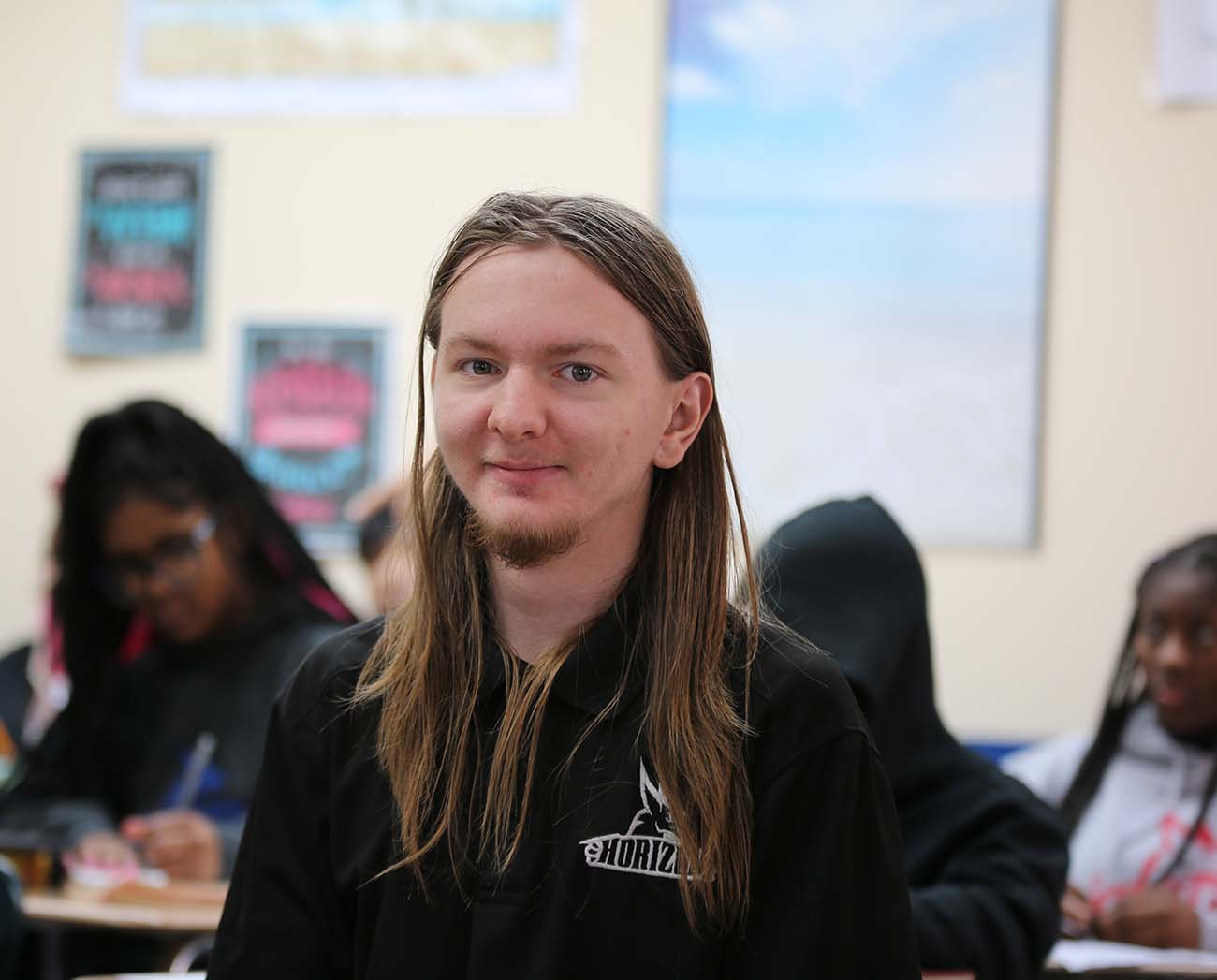 Smiling children together outdoors.